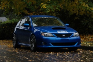 2008 Subaru Impreza with 18x9 Rota G-Force wheels