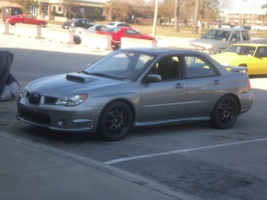 2006 Subaru Impreza with 18x8 Rota P1 wheels