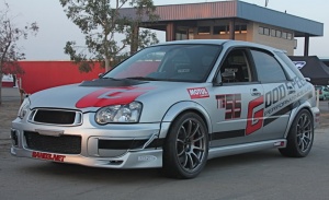 2004 Subaru Impreza with 18x9 Rota G-Force wheels