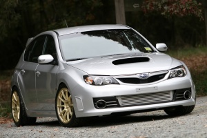 2008 Subaru Impreza with 18x9 Rota G-Force wheels