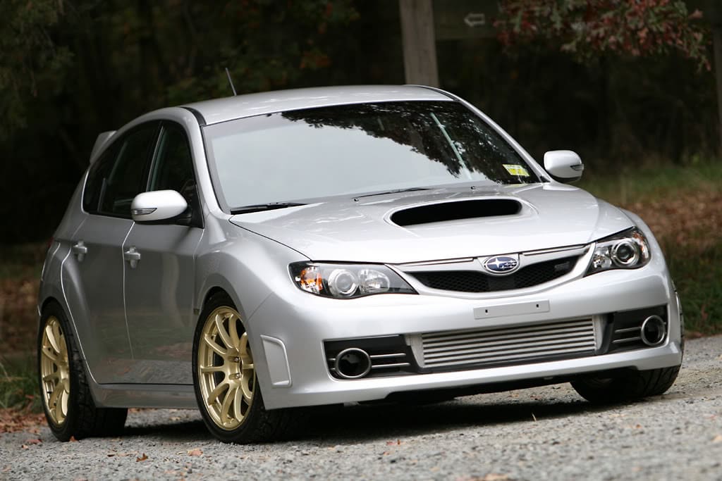 2008 Subaru Impreza with 18x9 Rota G-Force wheels