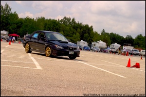 2006 Subaru Impreza with 17x8 Rota G-Force wheels