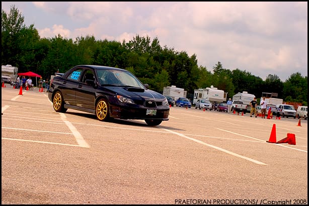 2006 Subaru Impreza with 17x8 Rota G-Force wheels
