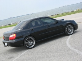 2006 Subaru Impreza with 18x8.5 Rota SVN wheels