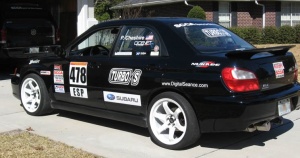 2003 Subaru Impreza with 18x9.5 Rota Grid wheels