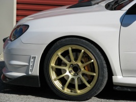 2006 Subaru Impreza with 18x9 Rota G-Force wheels