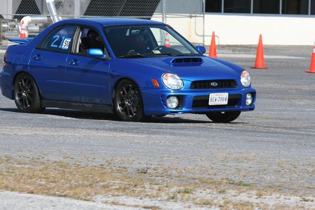 2003 Subaru Impreza with 17x8 Rota Torques wheels