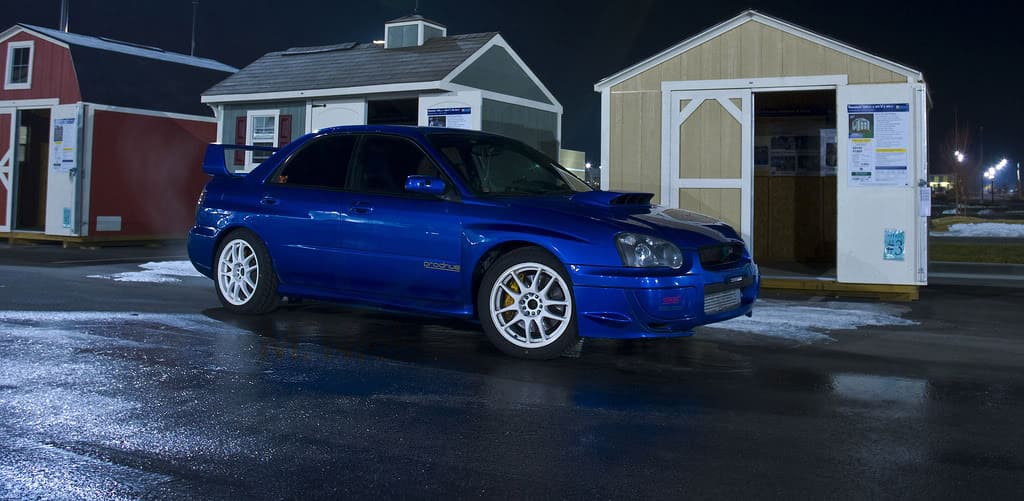 2004 Subaru Impreza with 18x9.5 Rota G-Force wheels