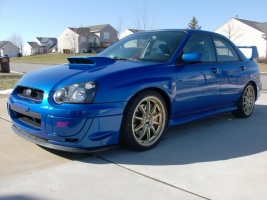 2004 Subaru Impreza with 18x8 Rota Tarmac 3 wheels