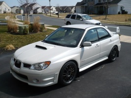 2006 Subaru Impreza with 18x8.5 Rota SVN wheels