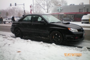 2006 Subaru Impreza with 17x8 Rota Slipstream wheels