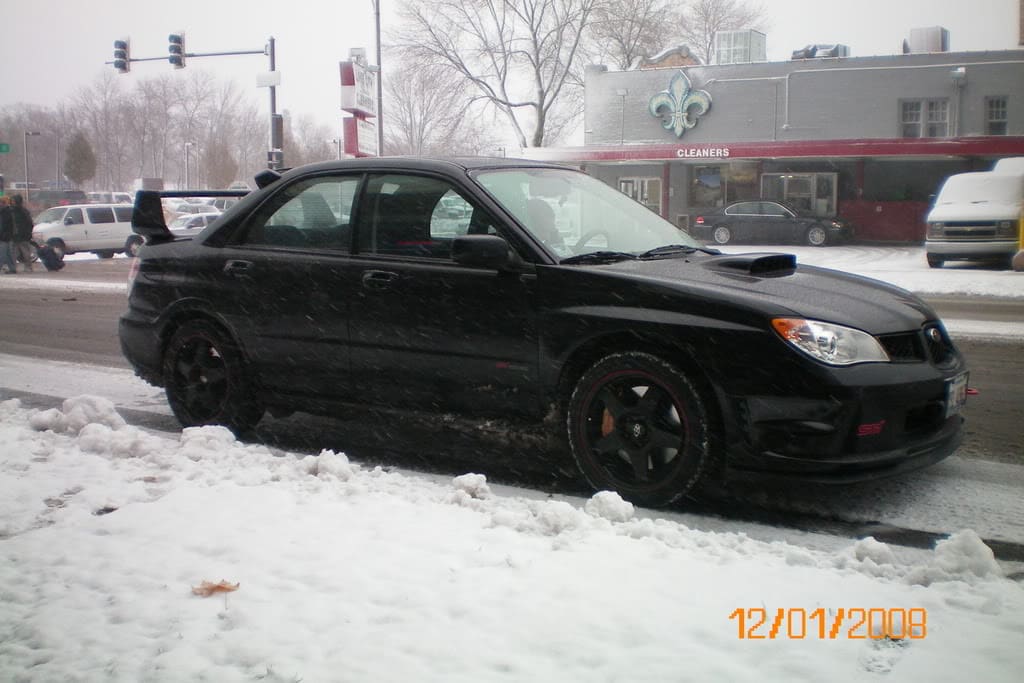 2006 Subaru Impreza with 17x8 Rota Slipstream wheels