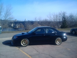 2008 Subaru Impreza with 17x9 Rota DPT wheels