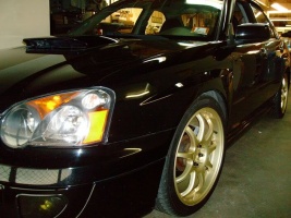 2004 Subaru Impreza with 18x8 Rota P1 wheels