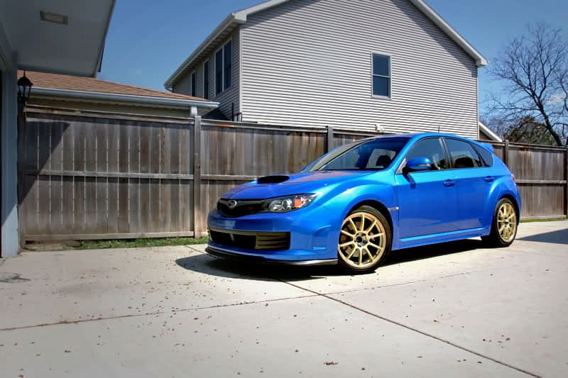 2008 Subaru Impreza with 18x8.5 Rota G-Force wheels