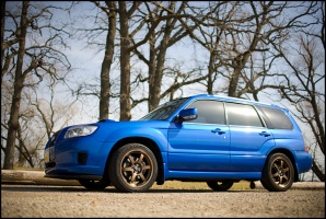2006 Subaru Impreza with 18x8.5 Rota SVN wheels