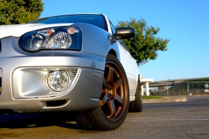2004 Subaru Impreza with 18x8.5 Rota Grid wheels