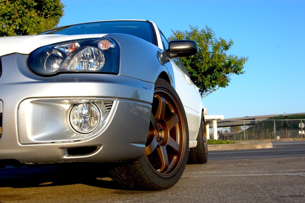 2004 Subaru Impreza with 18x8.5 Rota Grid wheels