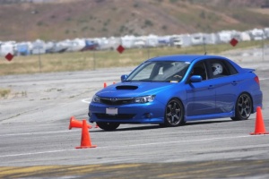 2008 Subaru Impreza with 18x8.5 Rota Grid wheels