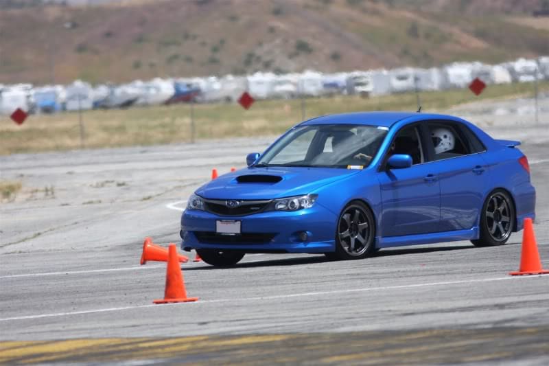 2008 Subaru Impreza with 18x8.5 Rota Grid wheels
