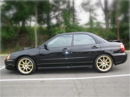 2004 Subaru Impreza with 18x8 Rota P1 wheels