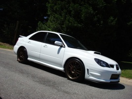 2008 Subaru Impreza with 18x8.5 Rota SVN wheels