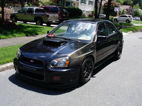 2004 Subaru Impreza with 17x9 Rota DPT wheels