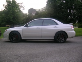 2008 Subaru Impreza with 18x8.5 Rota G-Force wheels