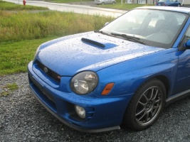 2003 Subaru Impreza with 17x8 Rota Torques wheels