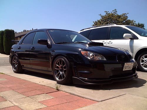 2006 Subaru Impreza with 17x9 Rota Torque R wheels