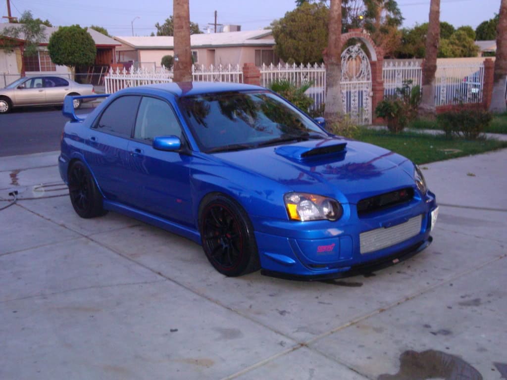 2004 Subaru Impreza with 18x9 Rota G-Force wheels