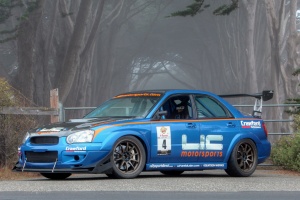 2004 Subaru Impreza with 18x9.5 Rota DPT wheels