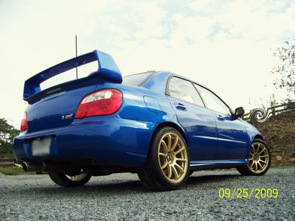 2004 Subaru Impreza with 18x9 Rota G-Force wheels
