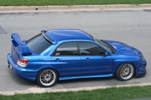 2006 Subaru Impreza with 18x8.5 Rota SVN wheels