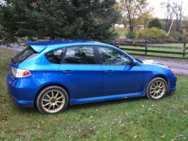 2009 Subaru Impreza with 17x7.5 Rota Tarmac 2 wheels