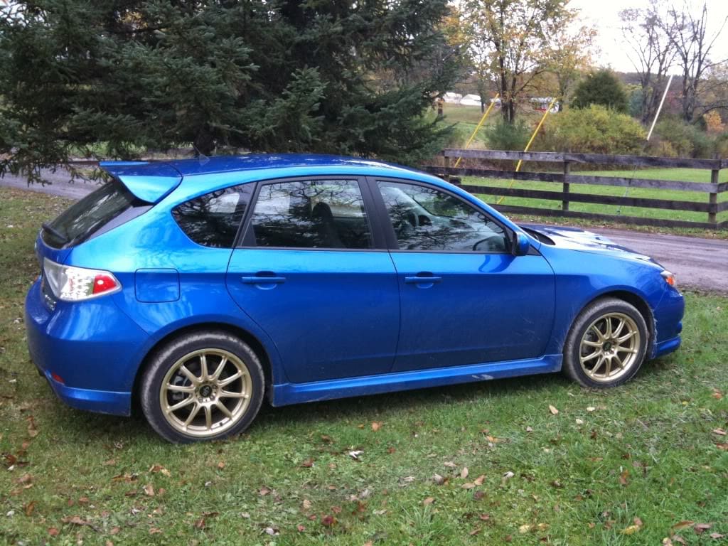2009 Subaru Impreza with 17x7.5 Rota Tarmac 2 wheels