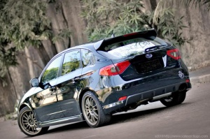 2009 Subaru Impreza with 18x8.5 Rota SVN wheels
