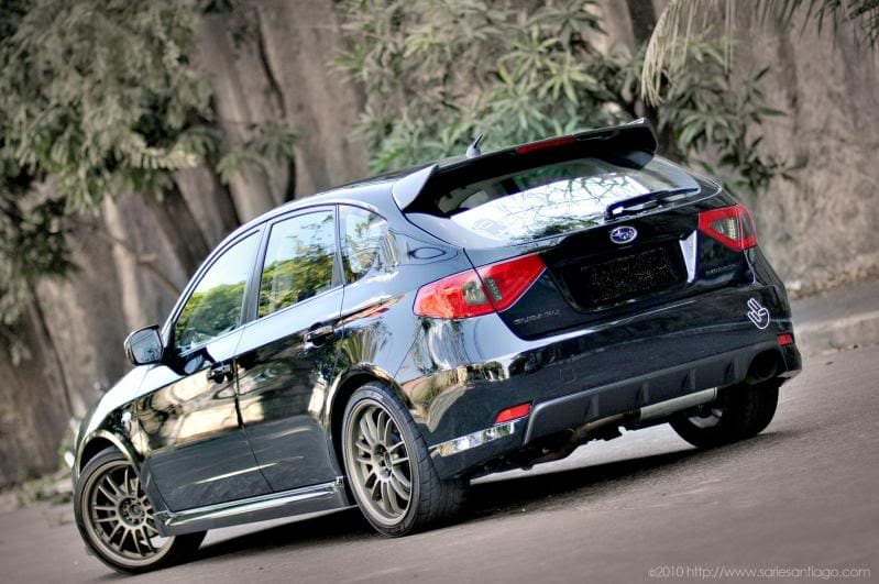 2009 Subaru Impreza with 18x8.5 Rota SVN wheels