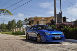 2004 Subaru Impreza with 18x8.5 Rota G-Force wheels