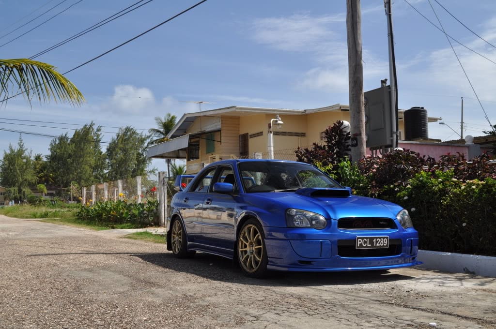2004 Subaru Impreza with 18x8.5 Rota G-Force wheels