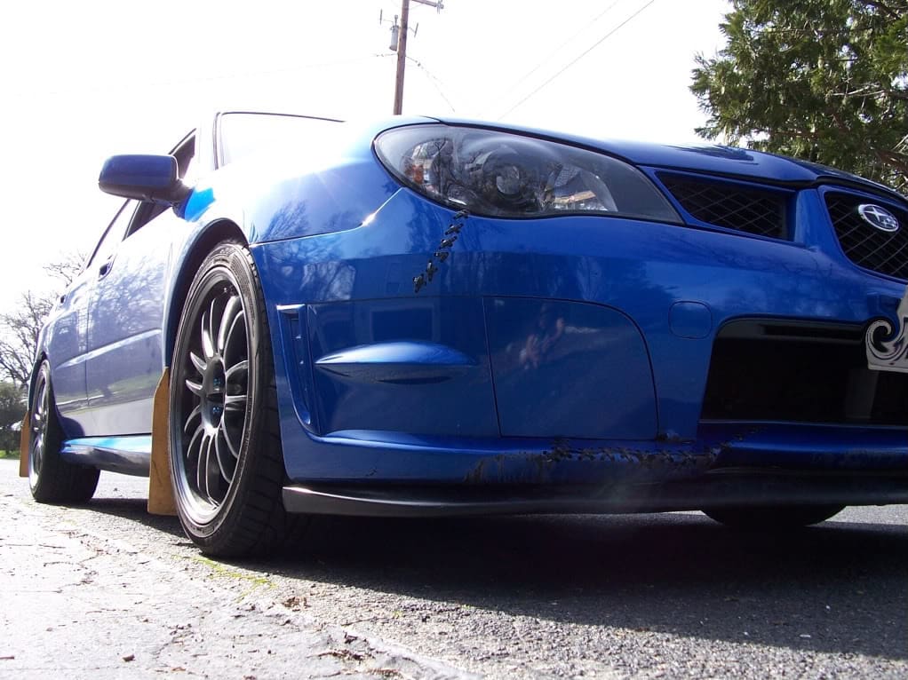 2007 Subaru Impreza with 18x8.5 Rota SVN wheels