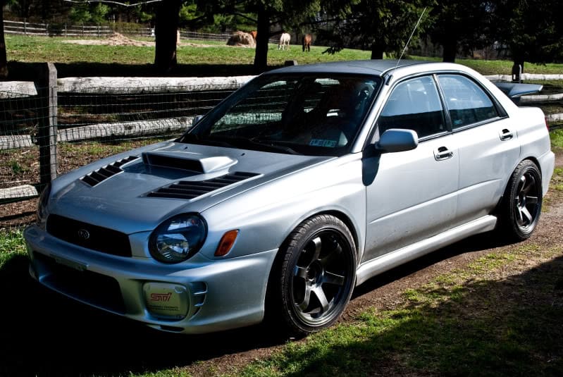 2003 Subaru Impreza with 18x9.5 Rota Grid wheels