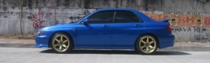 2003 Subaru Impreza with 18x9.5 Rota Grid wheels
