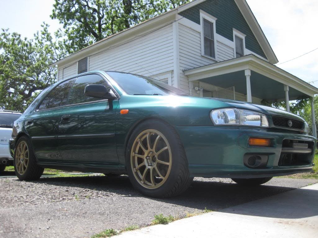 1999 Subaru Impreza with 17x7.5 Rota G-Force wheels