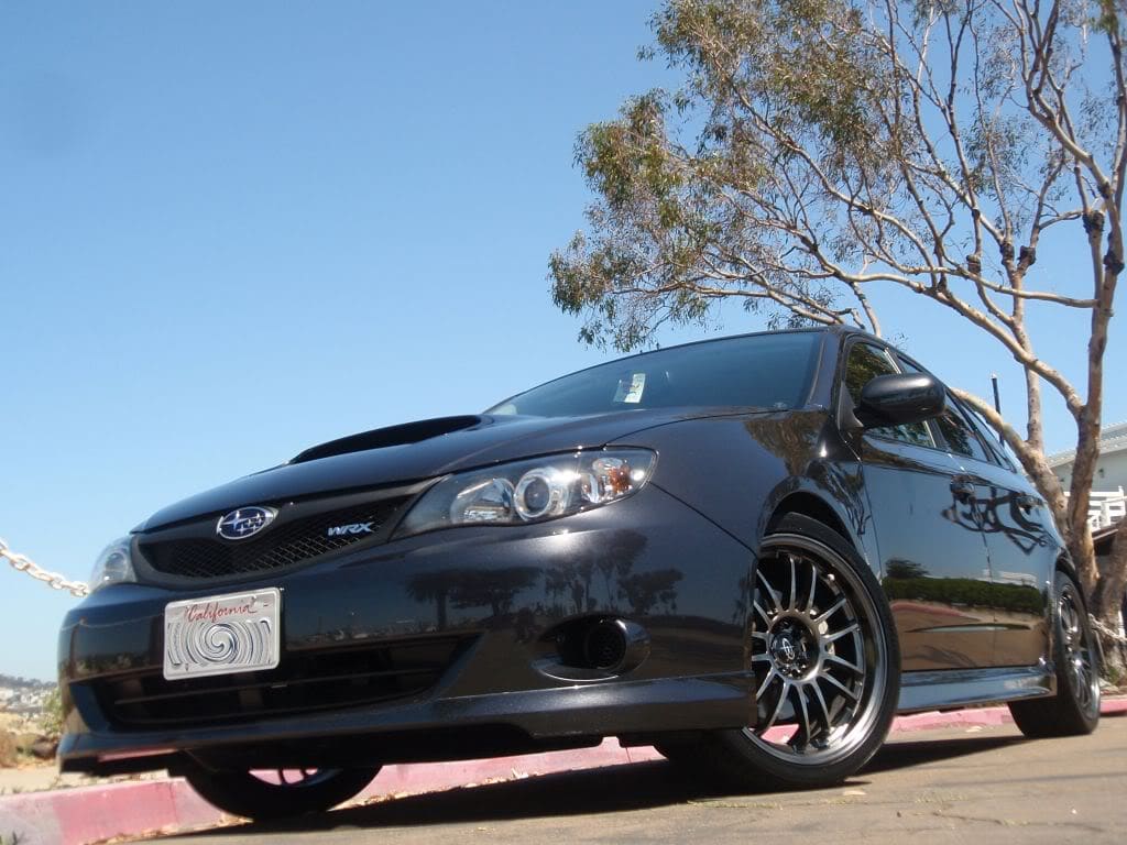 2009 Subaru Impreza with 18x8.5 Rota SVN wheels