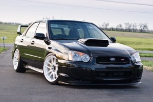 2004 Subaru Impreza with 18x9.5 Rota Torque-R wheels