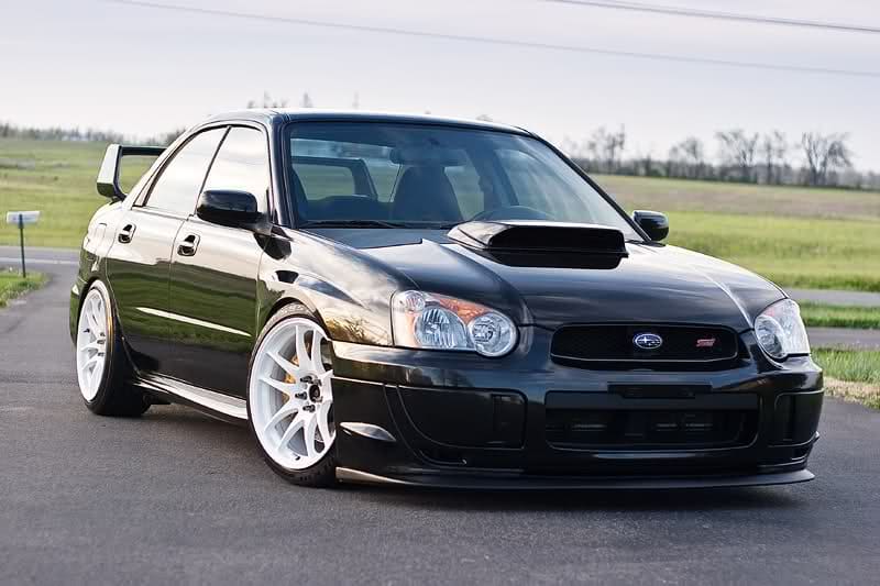 2004 Subaru Impreza with 18x9.5 Rota Torque-R wheels