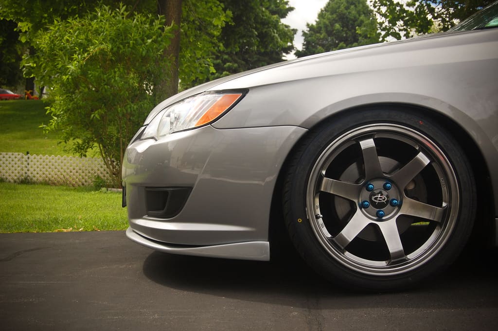 2008 Subaru Legacy with 18x9.5 Rota Grid wheels