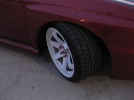 2003 Subaru Impreza with 18x9.5 Rota Grid wheels