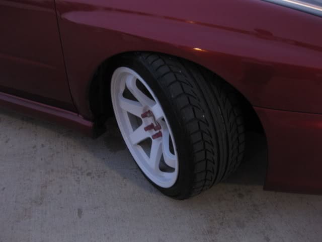 2003 Subaru Impreza with 18x9.5 Rota Grid wheels